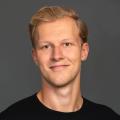 Emil Soerensen profile image: young nordic blond man wearing a black T-shirt