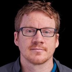 Tom Johnson profile picture: man with mustache and glasses